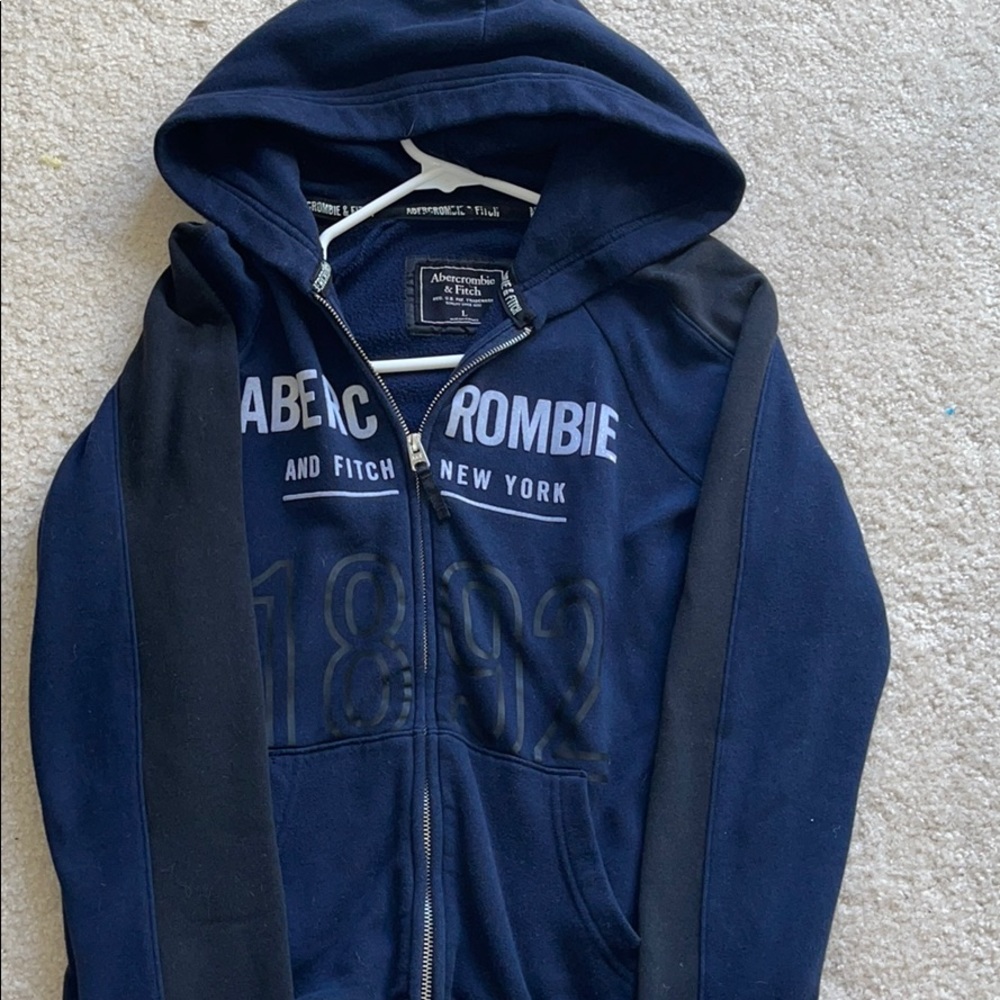 Black and blue zip up